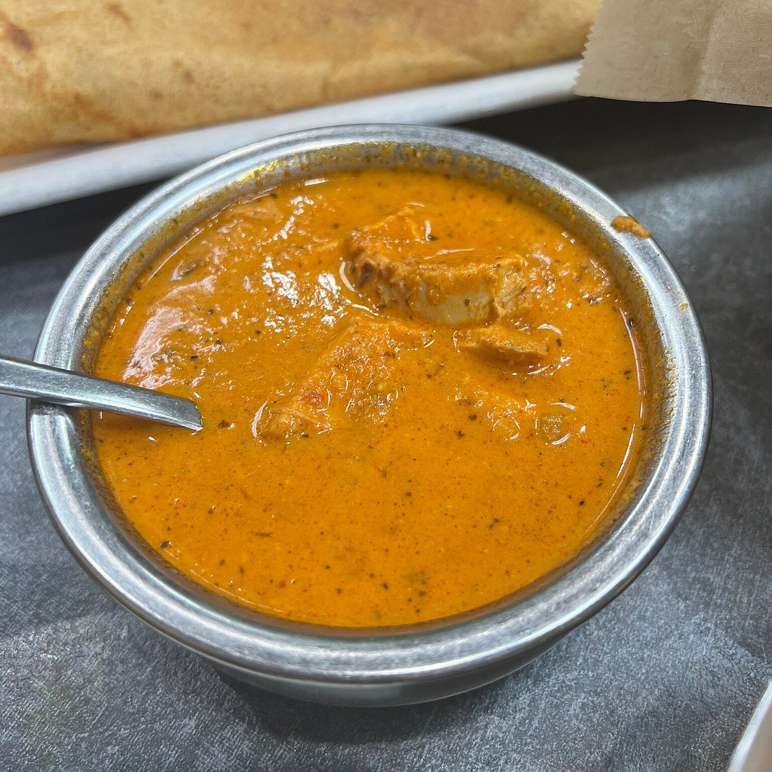 Bhanu Indian Cuisine & Market signature dishes Butter Chicken CurryChicken Tikka Masala Masala Dosa